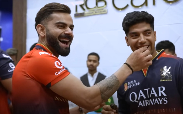 [WATCH] ‘Ungli chhod meri!’ – RCB youngster Swastik Chikara bites Virat Kohli’s finger, demands watch during birthday bash